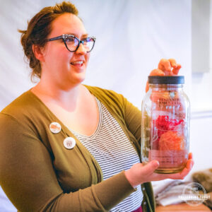 Lanni of Preserving Today holding jar.