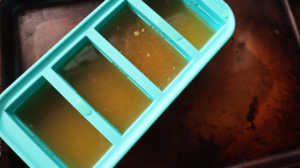 One cup size Souper Cubes full of broth for the freezer.